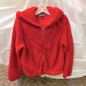 Ladies size medium zip up hooded jacket. Gently worn. No stains or tears.